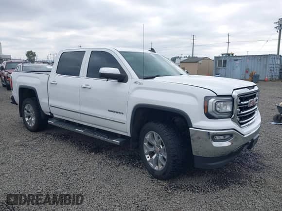 2018 GMC Sierra 1500 SLT z VIN 3GTU2NEC2JG474475, wystawiony jako IAAI lot #43194997 z przebiegiem 136 451 mil mil oraz . Historia ofert i sprzedaży dostępna na DreamBid. Obrazek 1.