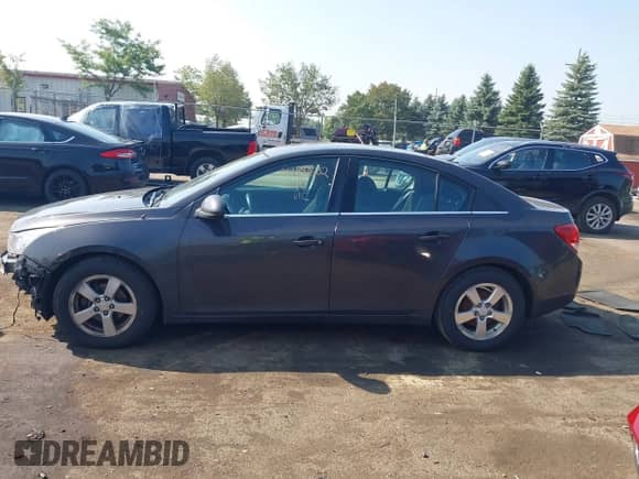 2014 Chevrolet Cruze 1LT с VIN 1G1PC5SB2E7182194, выставлен на аукционе IAAI как лот 42993632 с пробегом 184 775 миль миль и . История ставок и продаж доступна на DreamBid. Изображение 14.
