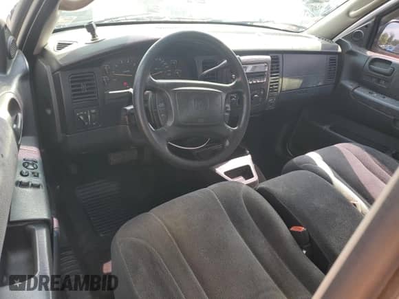 2001 Dodge Dakota Sport с VIN 1B7GG22N01S152414, выставлен на аукционе Copart как лот 66342335 с пробегом 147 060 миль миль и Списание • Salvage title. История ставок и продаж доступна на DreamBid. Изображение 8.