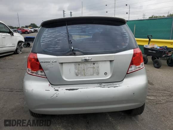 2005 Chevrolet Aveo LS with VIN KL1TD626X5B309614, listed as a Copart auction lot 66875445 with Not provided miles and Salvage title. Bid and sale history available at DreamBid. Image 6.