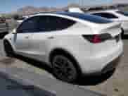 2021 Tesla Model Y Long Range with VIN 5YJYGDEEXMF112483, listed as a Copart auction lot 68286045 with 54,154 mi miles and Salvage title. Bid and sale history available at DreamBid. Image 2.
