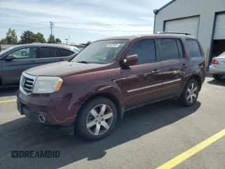 2012 Honda Pilot Touring with VIN 5FNYF4H91CB011378, listed as a Copart auction lot 59323605 with 181,255 mi miles and Salvage title. Bid and sale history available at DreamBid. Image 1.