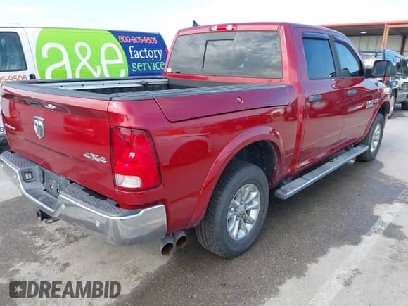 2014 Ram 1500 Big Horn z VIN 1C6RR7LT0ES399734, wystawiony jako IAAI lot #42877062 z przebiegiem 167 919 mil mil oraz . Historia ofert i sprzedaży dostępna na DreamBid. Obrazek 4.