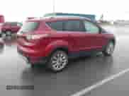 2017 Ford Escape Titanium z VIN 1FMCU9J97HUA95899, wystawiony jako IAAI lot #43365600 z przebiegiem 95 376 mil mil oraz . Historia ofert i sprzedaży dostępna na DreamBid. Obrazek 4.