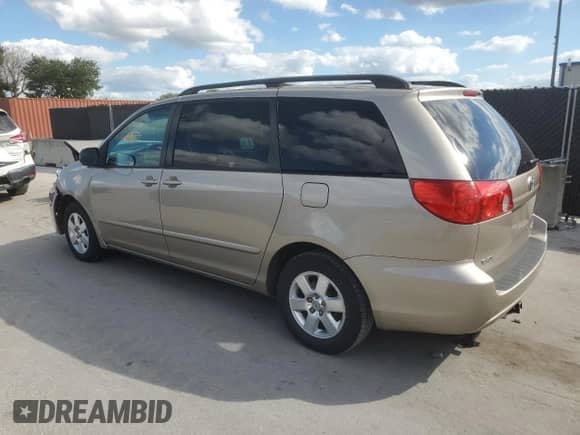 2010 Toyota Sienna CE z VIN 5TDKK4CC5AS336015, wystawiony jako Copart lot #87038765 z przebiegiem 241 385 mil mil oraz Szkoda całkowita • Salvage title. Historia ofert i sprzedaży dostępna na DreamBid. Obrazek 2.