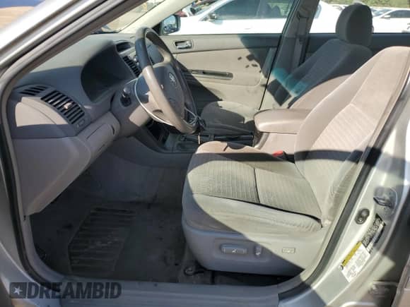 2006 Toyota Camry LE с VIN 4T1BE32K06U138709, выставлен на аукционе Copart как лот 81197175 с пробегом 247 758 миль миль и Списание • Salvage title. История ставок и продаж доступна на DreamBid. Изображение 7.