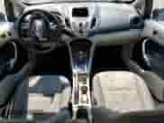 2012 Ford Fiesta SE с VIN 3FADP4BJ7CM186363, выставлен на аукционе Copart как лот 70279645 с пробегом 147 483 миль миль и Списание • Salvage title. История ставок и продаж доступна на DreamBid. Изображение 8.