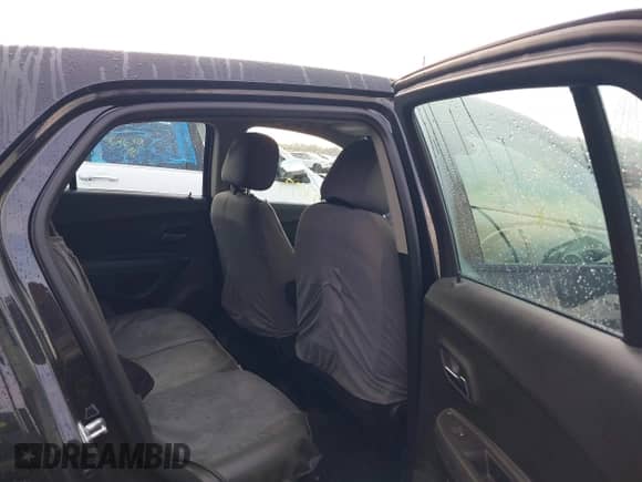 2016 Chevrolet Trax LS with VIN KL7CJNSB0GB607033, listed as a IAAI auction lot 42714403 with 153,502 mi miles and . Bid and sale history available at DreamBid. Image 8.