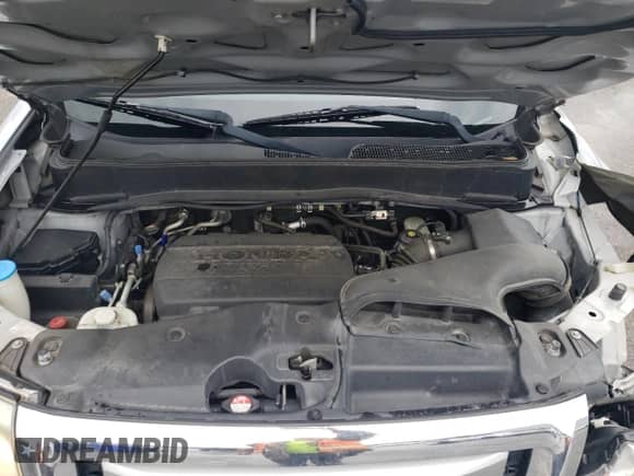 2011 Honda Pilot EX-L z VIN 5FNYF3H71BB033923, wystawiony jako Copart lot #56649305 z przebiegiem 132 304 mil mil oraz Szkoda całkowita • Salvage title. Historia ofert i sprzedaży dostępna na DreamBid. Obrazek 12.