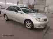 2005 Toyota Camry LE with VIN 4T1BE30KX5U015503, listed as a IAAI auction lot 43089512 with 204,687 mi miles and . Bid and sale history available at DreamBid. Image 1.