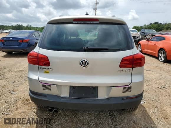 2013 Volkswagen Tiguan SE with VIN WVGAV7AX0DW556558, listed as a Copart auction lot 55574395 with 94,882 mi miles and Salvage title. Bid and sale history available at DreamBid. Image 6.