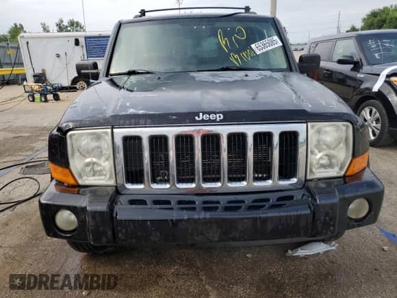 2007 Jeep Commander Sport z VIN 1J8HG48K37C584410, wystawiony jako Copart lot #65365085 z przebiegiem Nie podano mil oraz Szkoda całkowita • Salvage title. Historia ofert i sprzedaży dostępna na DreamBid. Obrazek 5.