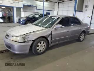 2000 Honda Accord EX with VIN 1HGCG6574YA084381, listed as a Copart auction lot 56219275 with 295,593 mi miles and Salvage title. Bid and sale history available at DreamBid. Image 1.