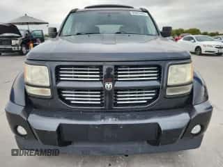 2011 Dodge Nitro Heat с VIN 1D4PU4GXXBW537684, выставлен на аукционе Copart как лот 89861445 с пробегом 100 138 миль миль и Чистый • Clean title. История ставок и продаж доступна на DreamBid. Изображение 5.