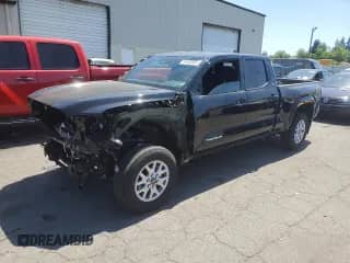 2024 Toyota Tacoma TRD Off Road with VIN 3TMLB5JN1RM085942, listed as a Copart auction lot 64483585 with 1,975 mi miles and Salvage title. Bid and sale history available at DreamBid. Image 1.