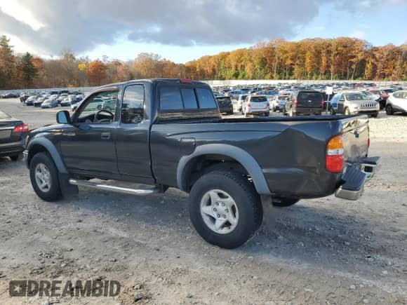 2001 Toyota Tacoma with VIN 5TEWN72N81Z873896, listed as a Copart auction lot 82741565 with 186,530 mi miles and Clean title. Bid and sale history available at DreamBid. Image 2.