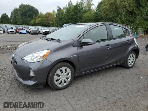 2014 Toyota Prius One z VIN JTDKDTB31E1067827, wystawiony jako Copart lot #80533345 z przebiegiem 109 309 mil mil oraz Szkoda całkowita • Salvage title. Historia ofert i sprzedaży dostępna na DreamBid. Obrazek 1.