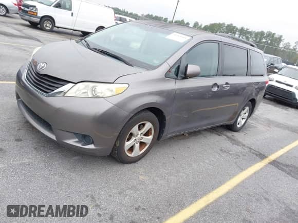2012 Toyota Sienna LE with VIN 5TDKK3DC2CS262161, listed as a IAAI auction lot 43543505 with 218,722 mi miles and . Bid and sale history available at DreamBid. Image 2.