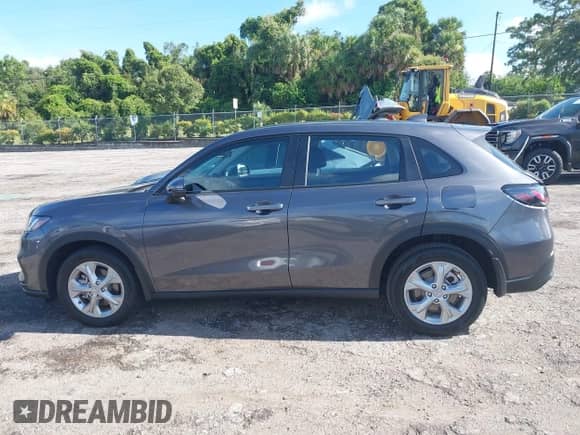 2025 Honda HR-V LX with VIN 3CZRZ1H38SM713952, listed as a IAAI auction lot 42744829 with 5,926 mi miles and . Bid and sale history available at DreamBid. Image 14.