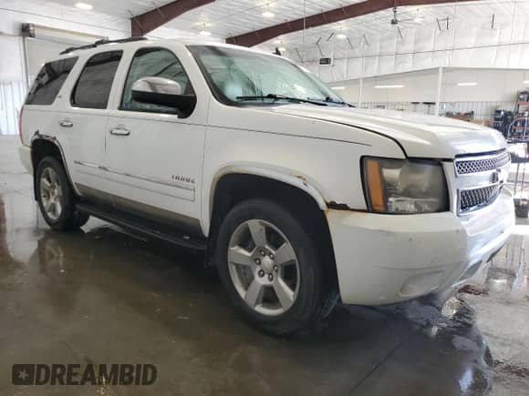 2011 Chevrolet Tahoe LTZ with VIN 1GNSKCE07BR115276, listed as a Copart auction lot 81818145 with 271,774 mi miles and Salvage title. Bid and sale history available at DreamBid. Image 4.