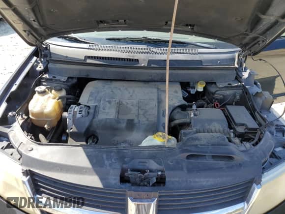 2010 Dodge Journey SXT with VIN 3D4PH5FV1AT125541, listed as a Copart auction lot 69966925 with 162,074 mi miles and Salvage title. Bid and sale history available at DreamBid. Image 12.