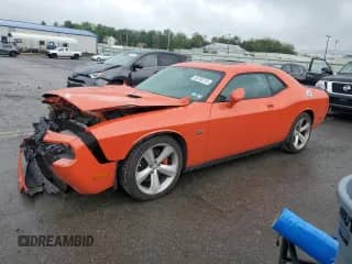 2008 Dodge Challenger SRT-8 with VIN 2B3LJ74WX8H311994, listed as a Copart auction lot 56700215 with 65,742 mi miles and Salvage title. Bid and sale history available at DreamBid. Image 1.