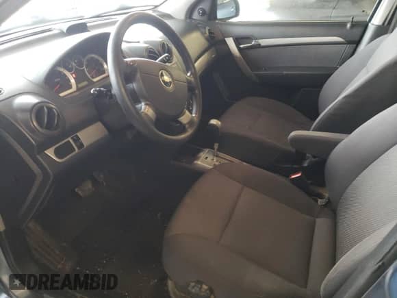 2007 Chevrolet Aveo LS z VIN KL1TD56697B119021, wystawiony jako Copart lot #67127784 z przebiegiem 178 885 mil mil oraz Szkoda całkowita • Salvage title. Historia ofert i sprzedaży dostępna na DreamBid. Obrazek 7.