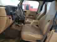 1999 Jeep Wrangler Sport with VIN 1J4FY19S6XP430964, listed as a Copart auction lot 85937775 with 109,444 mi miles and Clean title. Bid and sale history available at DreamBid. Image 7.