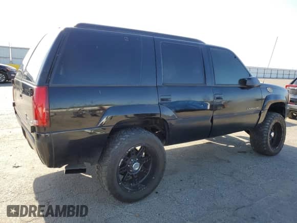 2000 Cadillac Escalade z VIN 1GYEK13R4YR103293, wystawiony jako Copart lot #58673244 z przebiegiem Nie podano mil oraz Nie do naprawy • Non repairable. Historia ofert i sprzedaży dostępna na DreamBid. Obrazek 3.