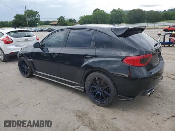 2009 Subaru WRX STI with VIN JF1GR89639L803560, listed as a Copart auction lot 56156594 with 87,680 mi miles and Salvage title. Bid and sale history available at DreamBid. Image 2.