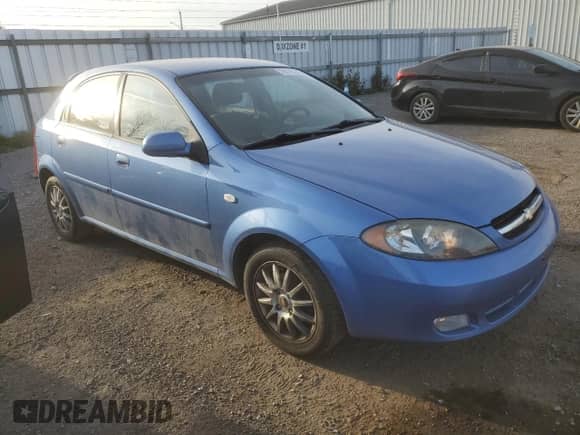 2005 Chevrolet Optra с VIN KL1JK69Z55K217355, выставлен на аукционе Copart как лот 76715574 с пробегом 111 798 миль миль и Чистый • Clean title. История ставок и продаж доступна на DreamBid. Изображение 4.