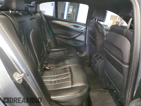 2018 BMW 5 Series M550i xDrive with VIN WBAJB9C51JB034817, listed as a Copart auction lot 69056245 with 132,405 mi miles and Salvage title. Bid and sale history available at DreamBid. Image 10.