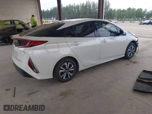 2018 Toyota Prius Plus z VIN JTDKARFP6J3073923, wystawiony jako IAAI lot #42580231 z przebiegiem 119 619 mil mil oraz . Historia ofert i sprzedaży dostępna na DreamBid. Obrazek 4.