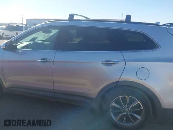 2017 Hyundai Santa Fe SE z VIN KM8SN4HF8HU175218, wystawiony jako IAAI lot #43491381 z przebiegiem 163 240 mil mil oraz . Historia ofert i sprzedaży dostępna na DreamBid. Obrazek 14.
