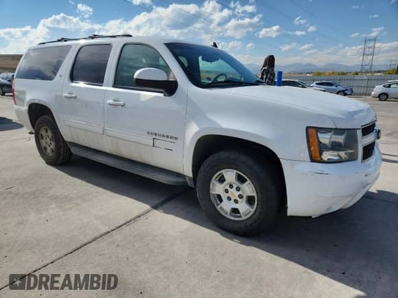 2013 Chevrolet Suburban LT with VIN 1GNSKJE72DR270919, listed as a Copart auction lot 86899285 with 214,999 mi miles and Clean title. Bid and sale history available at DreamBid. Image 4.