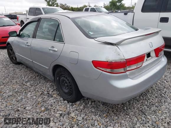 2003 Honda Accord LX with VIN 1HGCM66363A062055, listed as a IAAI auction lot 43278287 with 163,678 mi miles and . Bid and sale history available at DreamBid. Image 3.