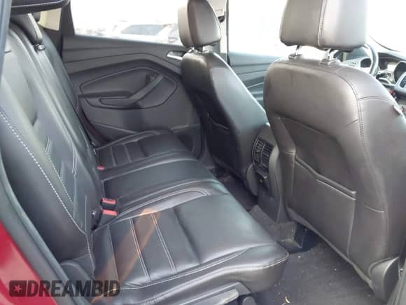 2017 Ford Escape Titanium with VIN 1FMCU0J97HUB23535, listed as a IAAI auction lot 43246540 with 97,026 mi miles and . Bid and sale history available at DreamBid. Image 8.