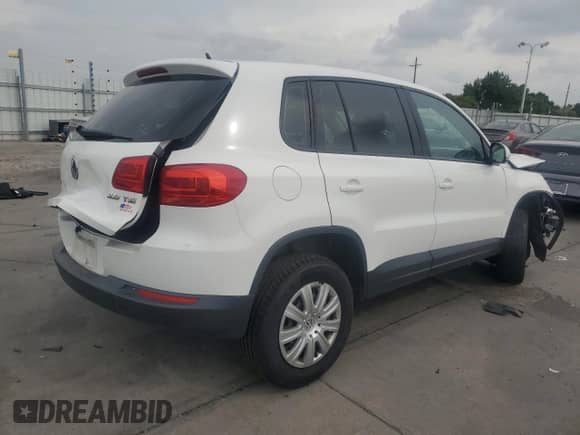 2013 Volkswagen Tiguan S с VIN WVGCV7AX0DW513556, выставлен на аукционе Copart как лот 66829465 с пробегом 164 597 миль миль и Списание • Salvage title. История ставок и продаж доступна на DreamBid. Изображение 3.