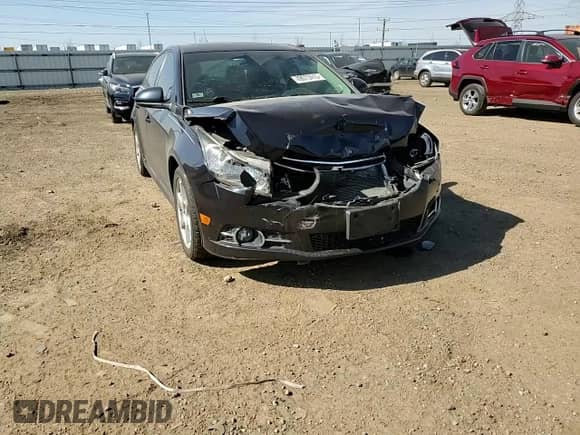 2014 Chevrolet Cruze 2LT z VIN 1G1PE5SB8E7288448, wystawiony jako Copart lot #49073415 z przebiegiem 65 413 mil mil oraz Szkoda całkowita • Salvage title. Historia ofert i sprzedaży dostępna na DreamBid. Obrazek 11.