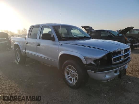 2004 Dodge Dakota Sport z VIN 1D7HL38N24S634602, wystawiony jako Copart lot #74386034 z przebiegiem 158 855 mil mil oraz Szkoda całkowita • Salvage title. Historia ofert i sprzedaży dostępna na DreamBid. Obrazek 4.