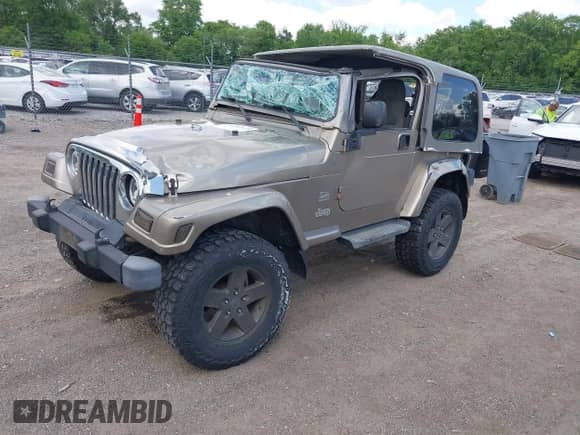 2004 Jeep Wrangler Sahara с VIN 1J4FA59S54P740417, выставлен на аукционе IAAI как лот 42382078 с пробегом 200 108 миль миль и . История ставок и продаж доступна на DreamBid. Изображение 2.