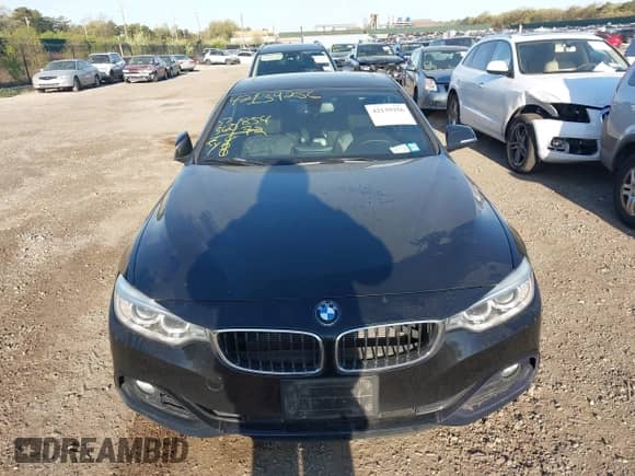 2014 BMW 4 Series 428i xDrive with VIN WBA3N9C55EF721295, listed as a IAAI auction lot 42139256 with 85,472 mi miles and . Bid and sale history available at DreamBid. Image 12.