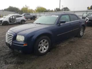 2006 Chrysler 300 Touring with VIN 2C3KA53G56H497843, listed as a Copart auction lot 85123995 with 157,853 mi miles and Salvage title. Bid and sale history available at DreamBid. Image 1.