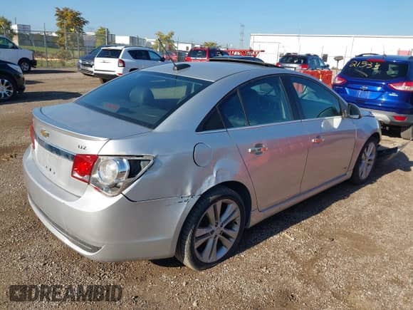 2015 Chevrolet Cruze LTZ с VIN 1G1PG5SB2F7255814, выставлен на аукционе IAAI как лот 43219325 с пробегом 124 764 миль миль и . История ставок и продаж доступна на DreamBid. Изображение 4.