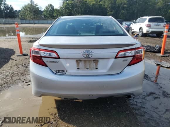 2014 Toyota Camry LE with VIN 4T1BF1FK0EU770393, listed as a Copart auction lot 83799895 with 231,676 mi miles and Salvage title. Bid and sale history available at DreamBid. Image 6.