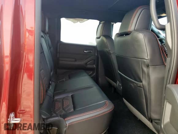 2025 Nissan Frontier Pro-X with VIN 1N6ED1EJXSN637854, listed as a Copart auction lot 65409335 with 2,410 mi miles and Salvage title. Bid and sale history available at DreamBid. Image 10.