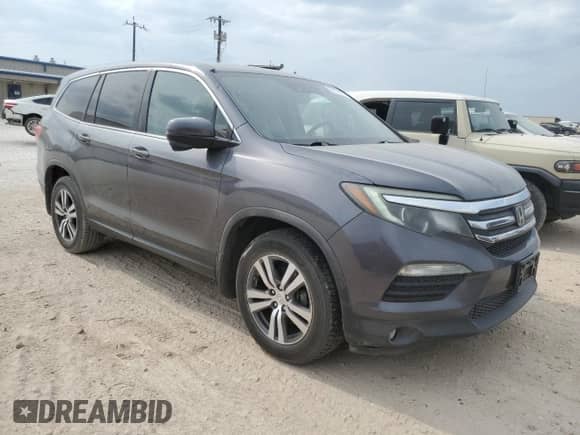 2018 Honda Pilot EX-L z VIN 5FNYF6H68JB017788, wystawiony jako Copart lot #53171515 z przebiegiem 119 277 mil mil oraz Czysty tytuł • Clean title. Historia ofert i sprzedaży dostępna na DreamBid. Obrazek 4.