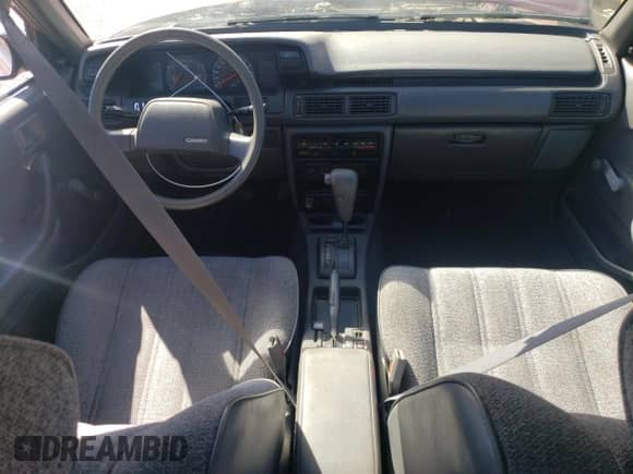 1991 Toyota Camry z VIN 4T1SV24E7MU338324, wystawiony jako Copart lot #90540185 z przebiegiem 124 473 mil mil oraz Czysty tytuł • Clean title. Historia ofert i sprzedaży dostępna na DreamBid. Obrazek 8.