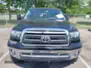 2012 Toyota Tundra z VIN 5TFRY5F10CX117652, wystawiony jako IAAI lot #42617080 z przebiegiem 233 560 mil mil oraz . Historia ofert i sprzedaży dostępna na DreamBid. Obrazek 12.