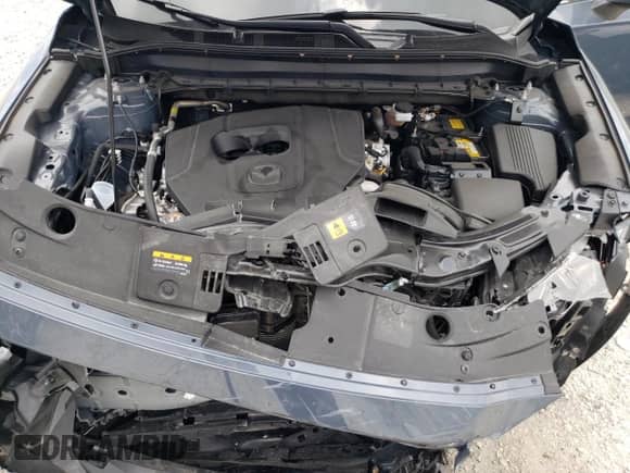 2025 Mazda CX-5 S Carbon Edition z VIN JM3KFBCM7S0681298, wystawiony jako Copart lot #69565385 z przebiegiem 9 552 mil mil oraz Czysty tytuł • Clean title. Historia ofert i sprzedaży dostępna na DreamBid. Obrazek 12.